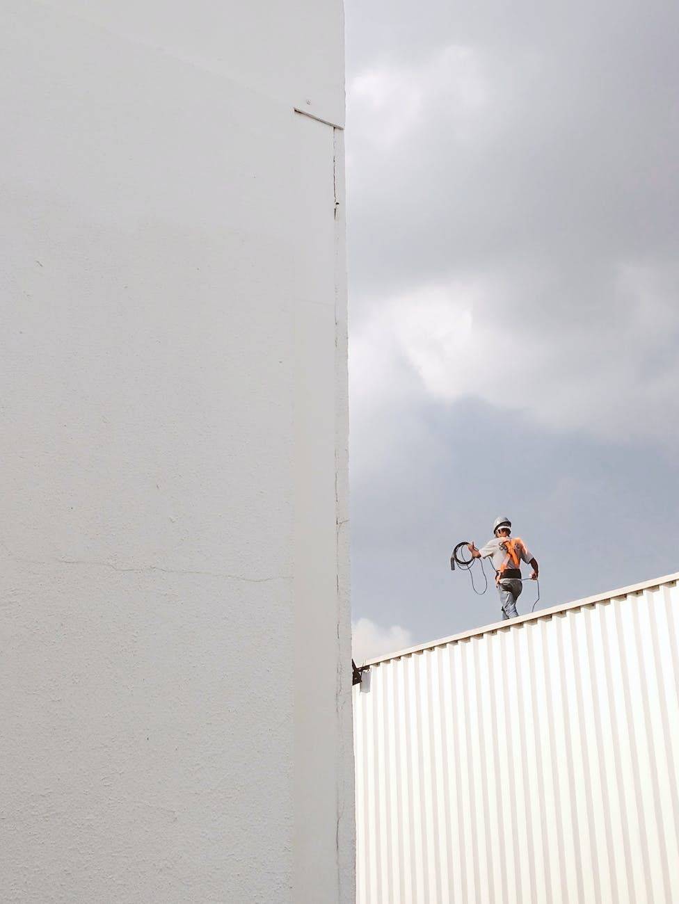 man walking on roof top